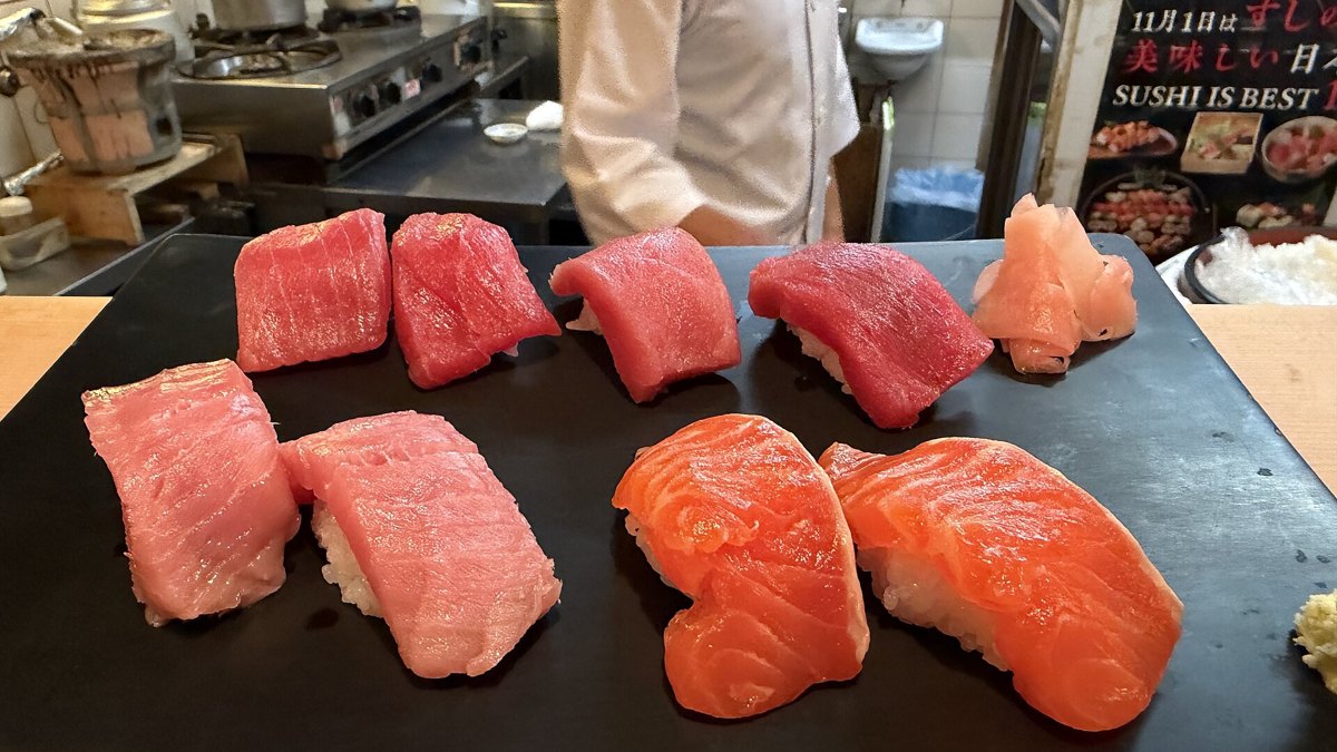 A plate of assorted nigiri sushi