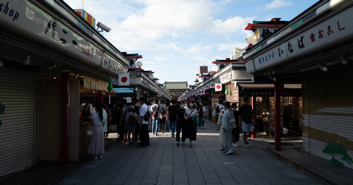 Nakamise shopping street approaching Sensoji, lined with stalls and walked by visitors