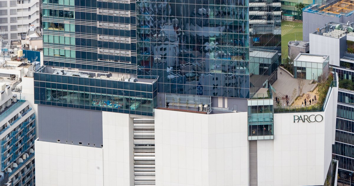 Aerial view of the rebuilt Shibuya PARCO building with its rooftop terrace among surrounding blocks