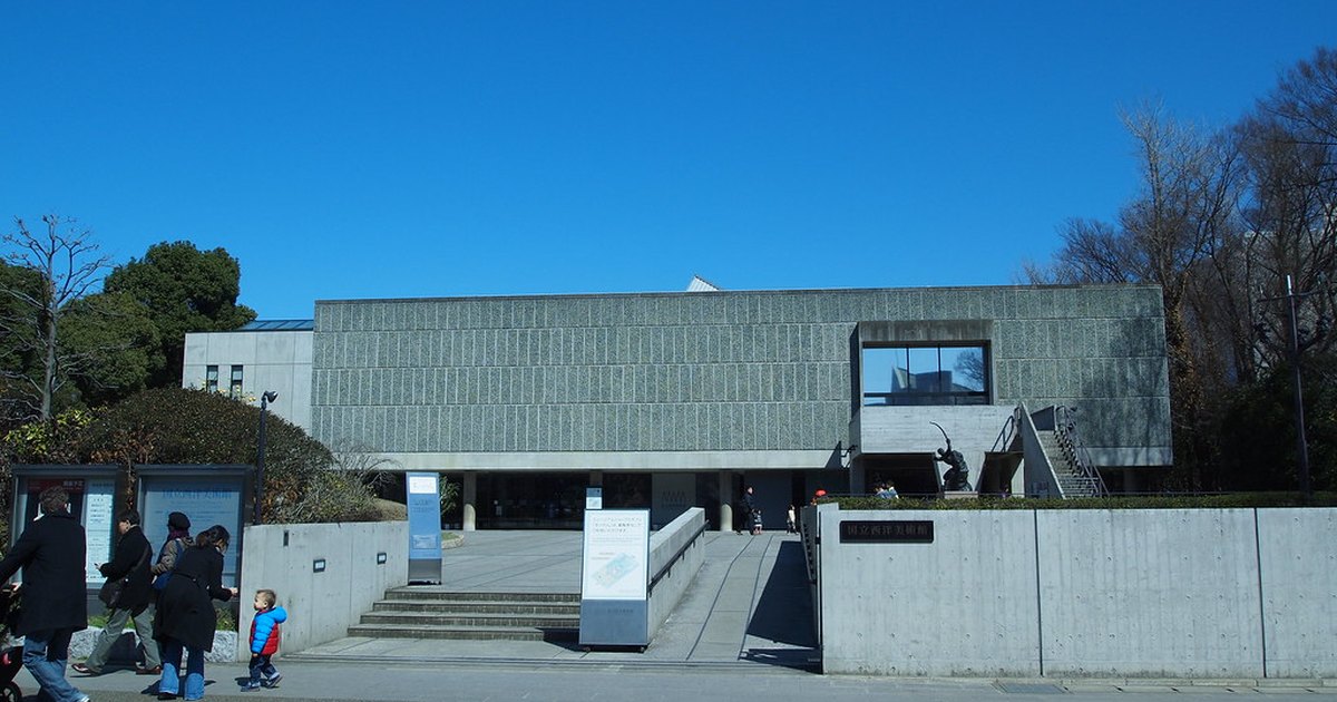 The concrete facade of the National Museum of Western Art in Ueno Park under a clear sky
