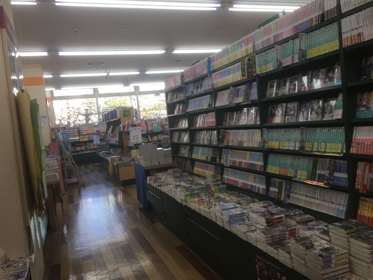Rows of bookshelves inside a bookshop in Tokyo