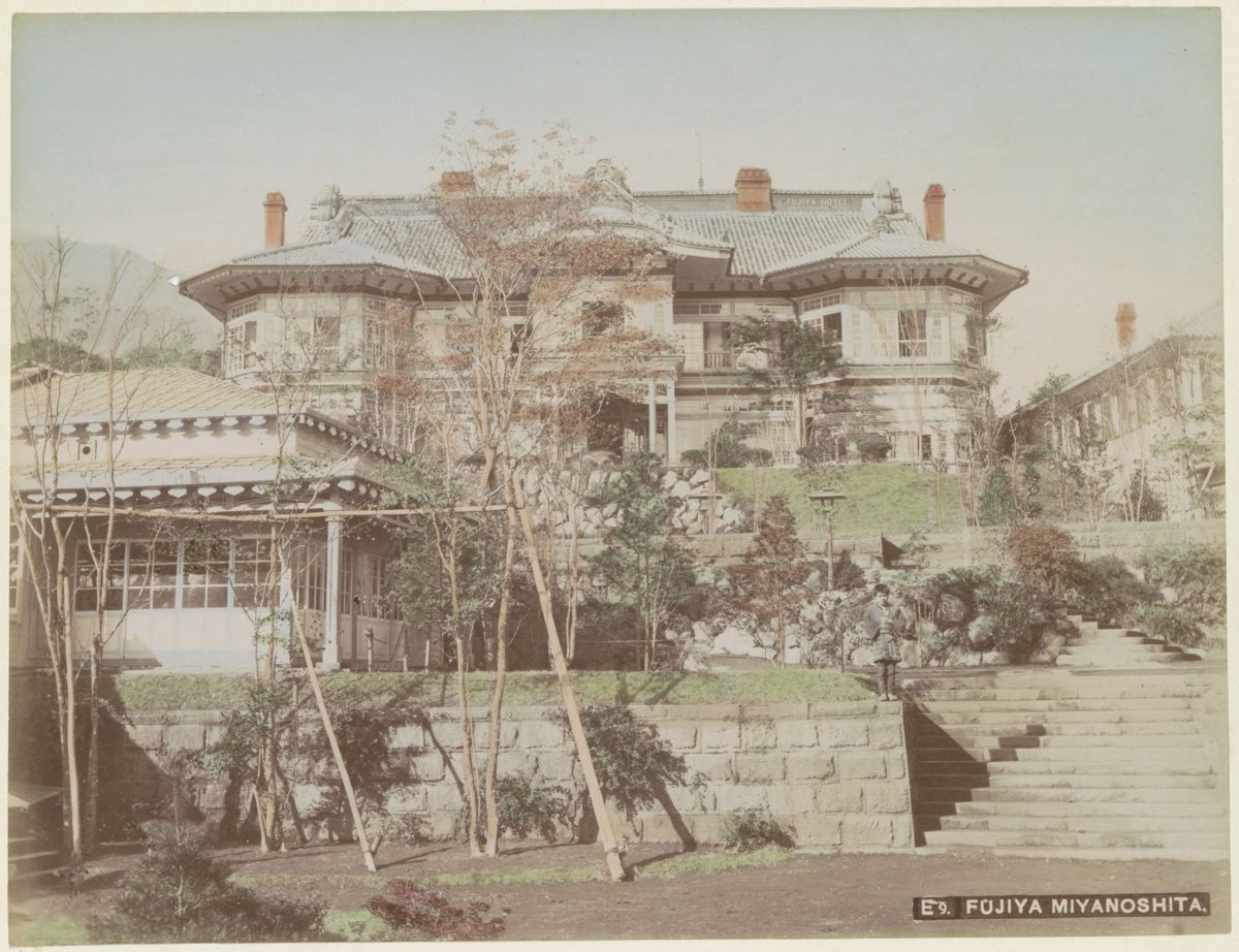 Historic photograph of the Fujiya Hotel facade and gardens