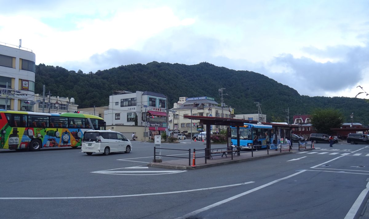 The bus and taxi area outside Kawaguchiko Station, with a bus stop shelter