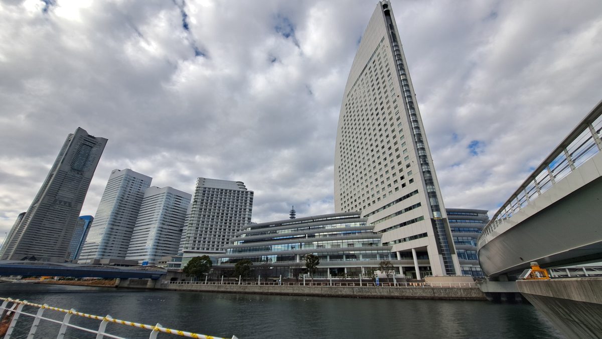 InterContinental Yokohama Grand beside the canal with Yokohama Landmark Tower and other Minato Mirai towers