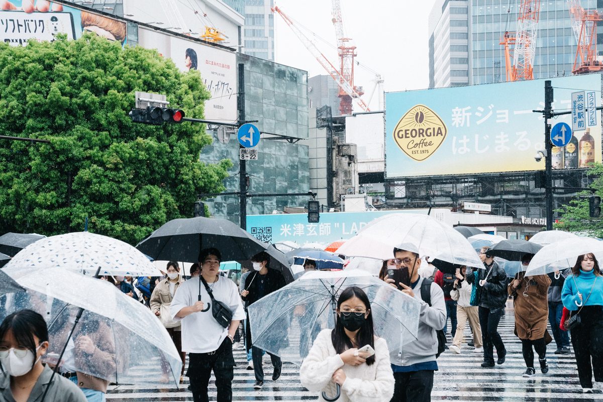Umbrellas at Shibuya Crossing on a rainy day