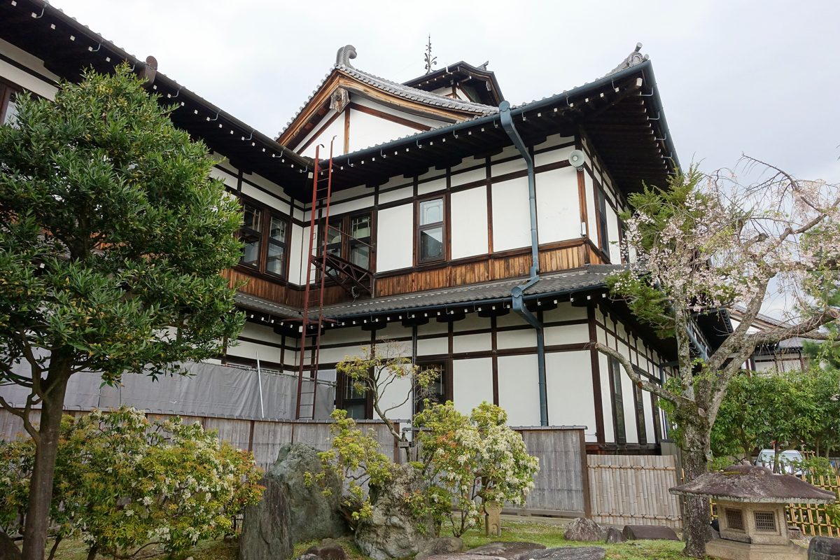 The two-story wooden Main Building of Nara Hotel with a Japanese-style tiled roof