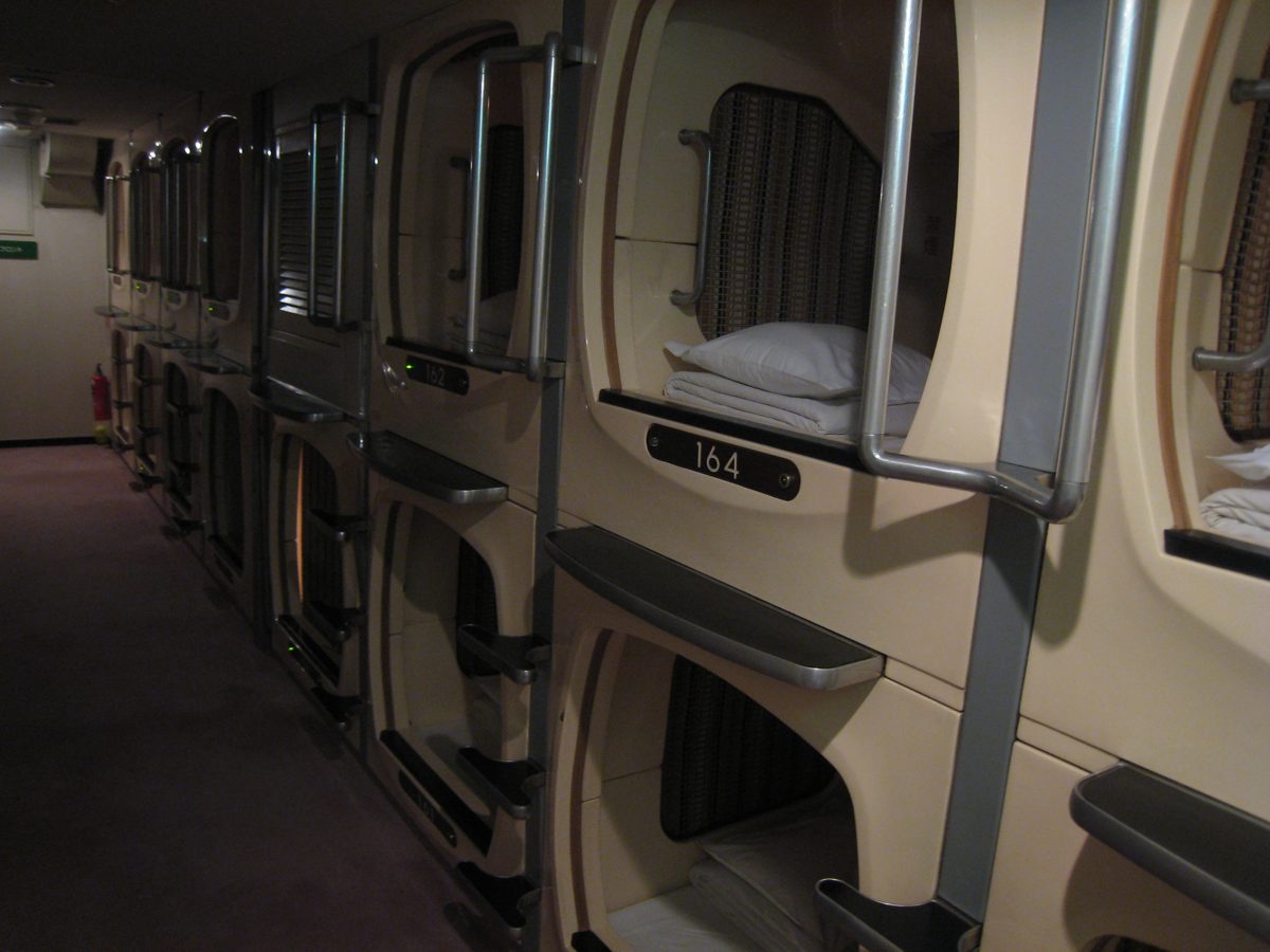 Rows of capsule units in a Japanese capsule hotel