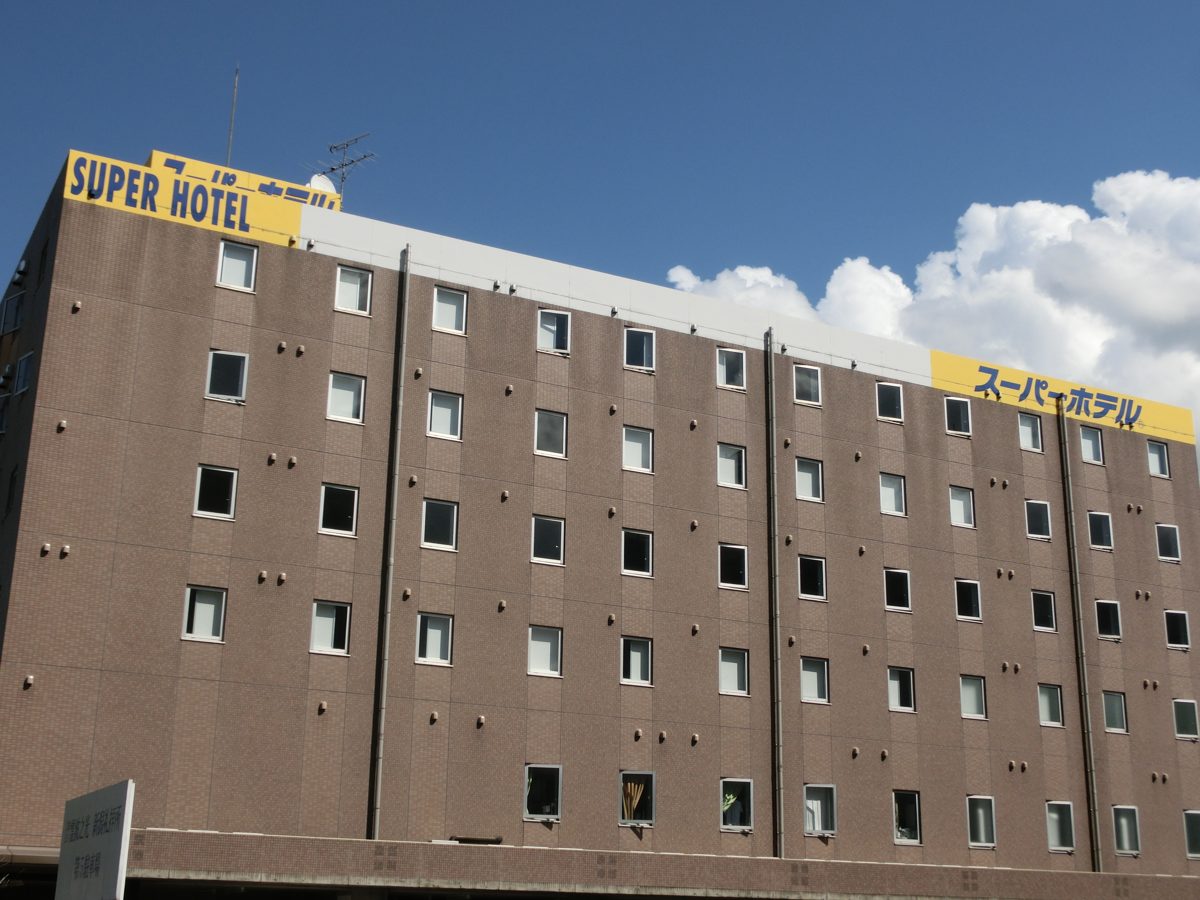 Super Hotel Niigata exterior with sign