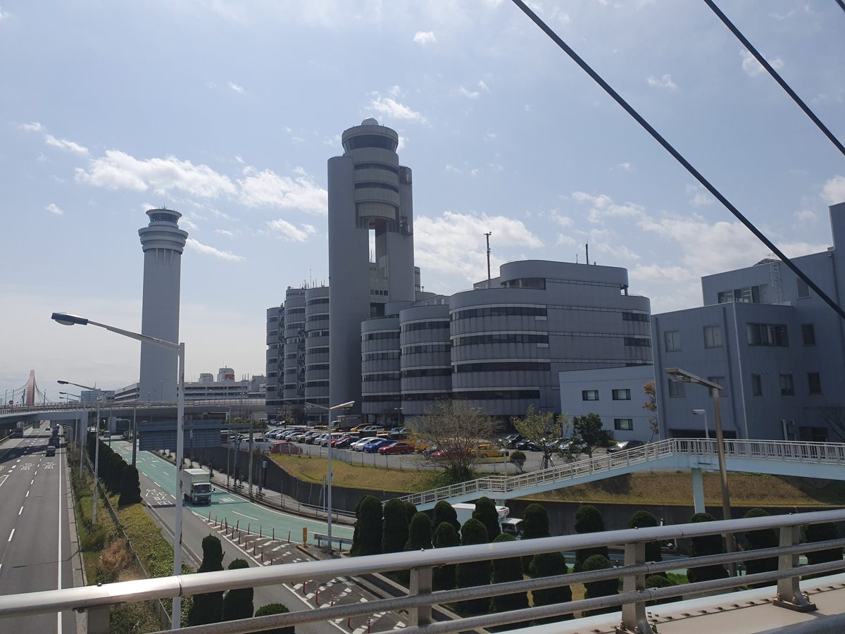 Haneda Airport control towers and buildings seen from a bridge