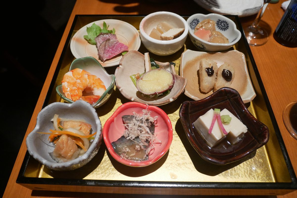 Small dishes of Kyoto home-style food on a tray